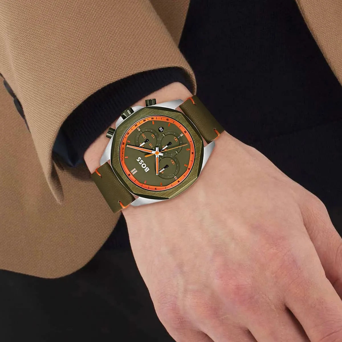 Hugo Boss Cloud chronograph watch worn on wrist showing green dial and leather strap