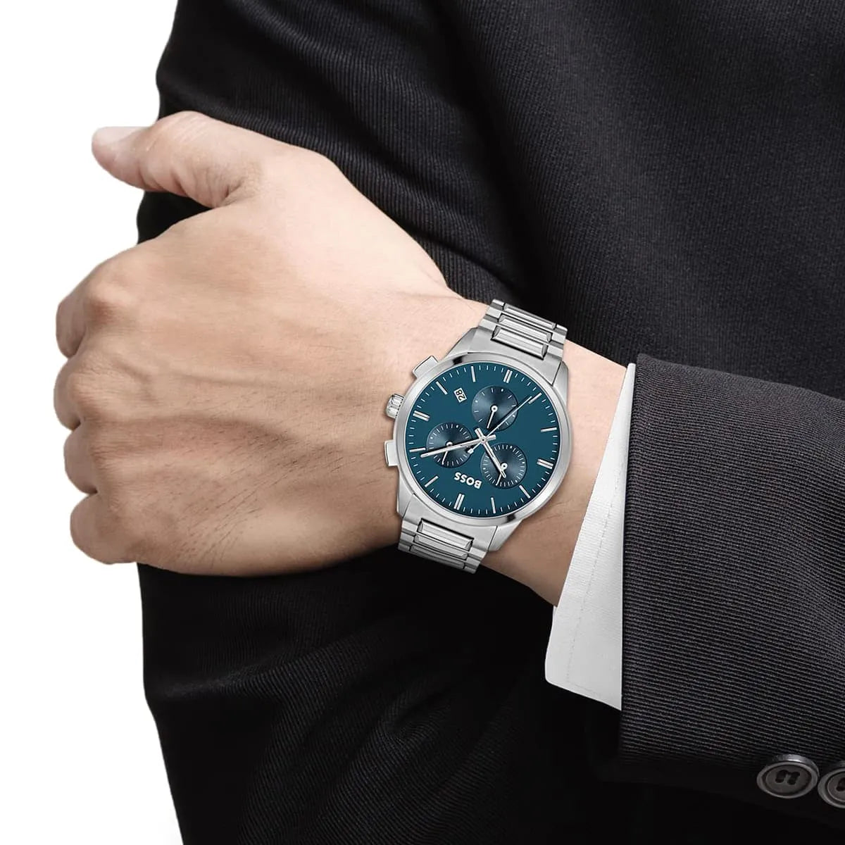 Hugo Boss Dapper chronograph watch on wrist with blue dial and silver metal bracelet