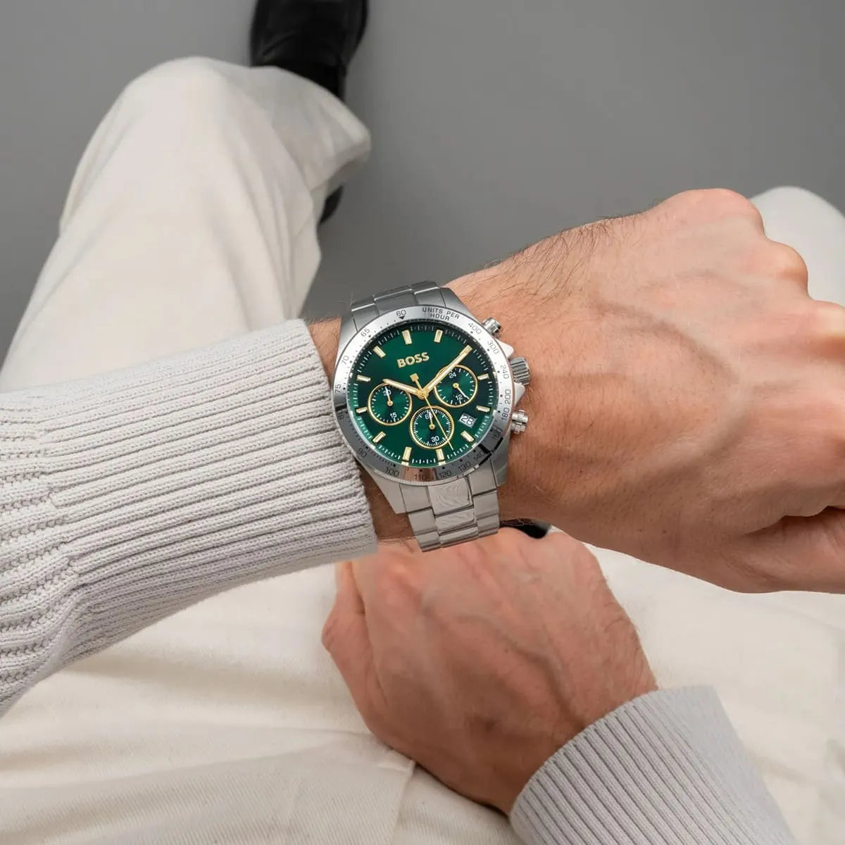 Hugo Boss Hero chronograph watch worn on wrist, green dial with gold accents visible