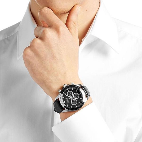 Hugo Boss Ikon chronograph watch on wrist showing dial and case design with black strap