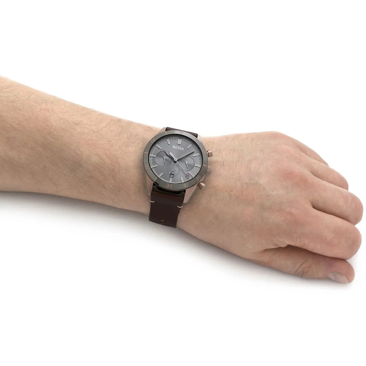 Hugo Boss Santiago chronograph watch worn on wrist showing grey dial and brown leather strap