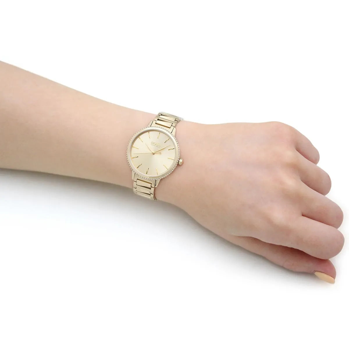 Hugo Boss Signature women's gold watch worn on wrist