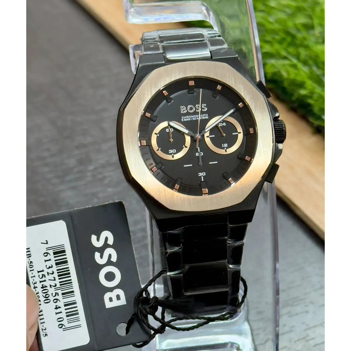 Hugo Boss Taper chronograph watch worn on wrist showing black dial and rose gold case styling
