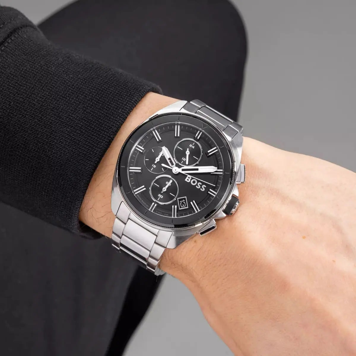 Hugo Boss Volane chronograph watch worn on wrist with black dial
