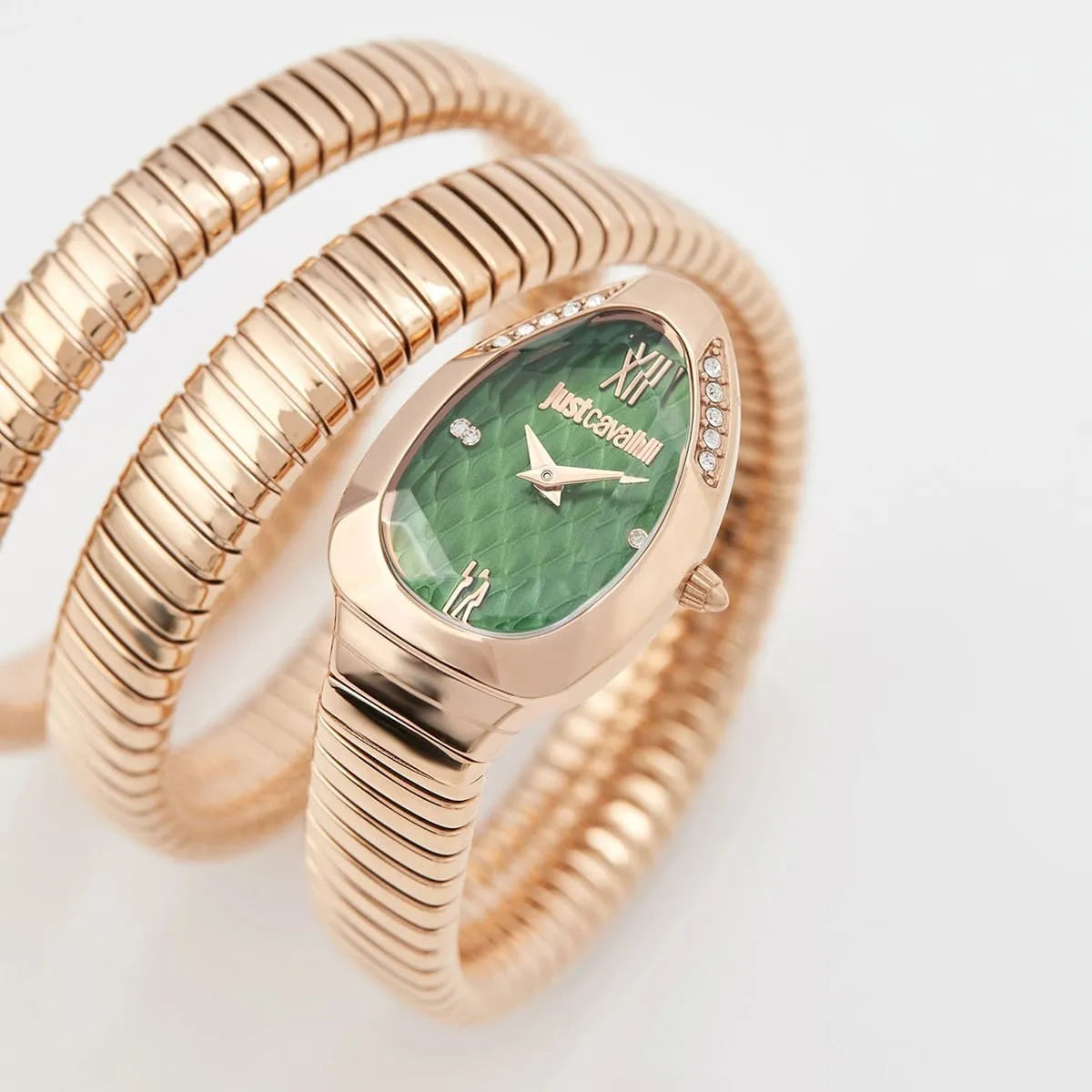 Close-up of Just Cavalli Glam Evo 9 green dial with rose gold case and crystals