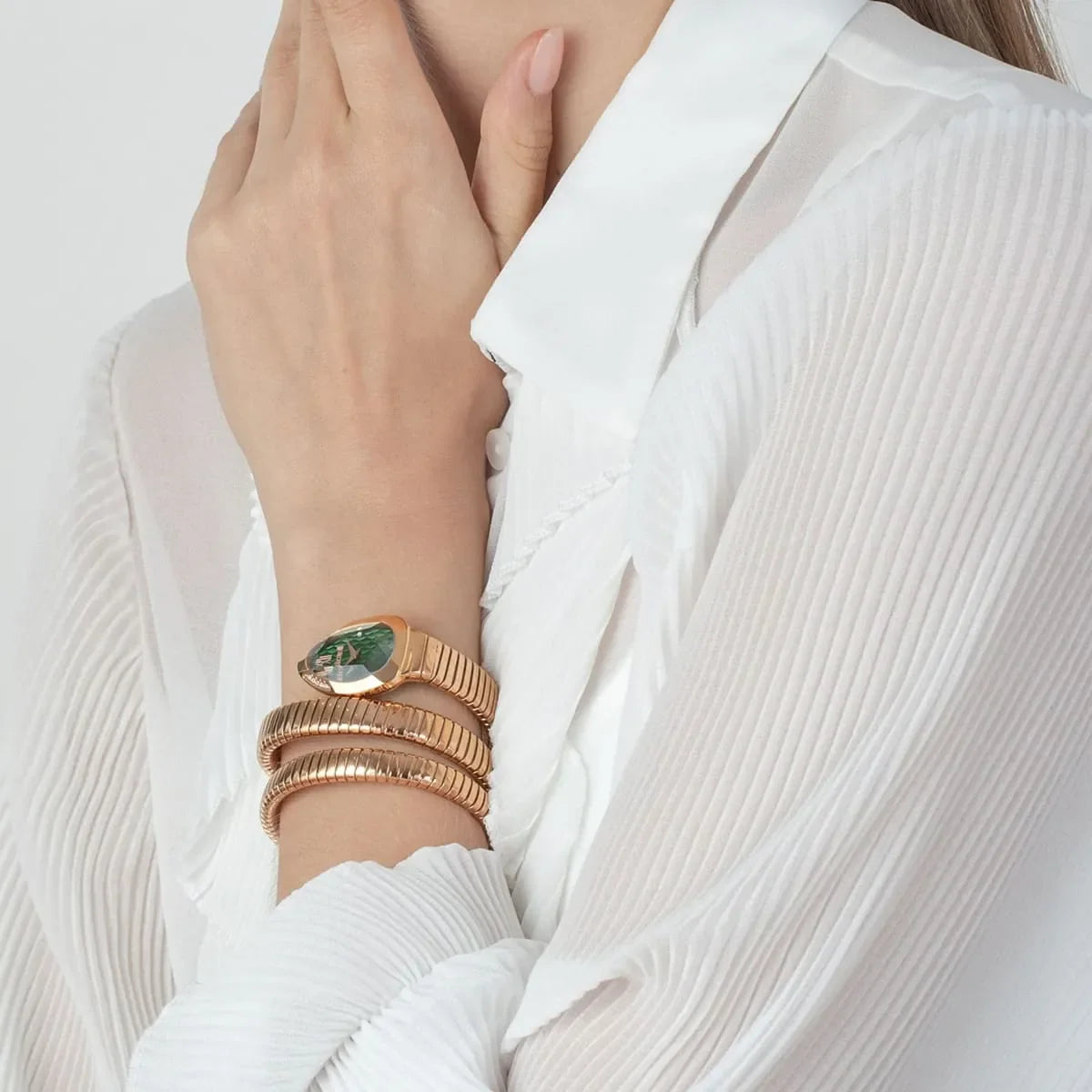 Just Cavalli Glam Evo 9 watch worn on wrist with triple-wrap rose gold strap
