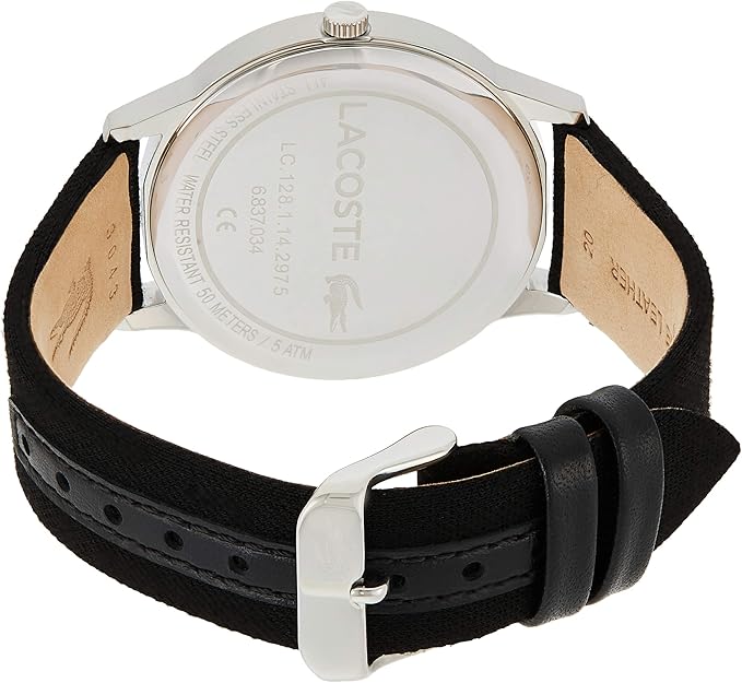 Watch caseback showing Lacoste branding, stainless steel case, and black fabric strap with buckle