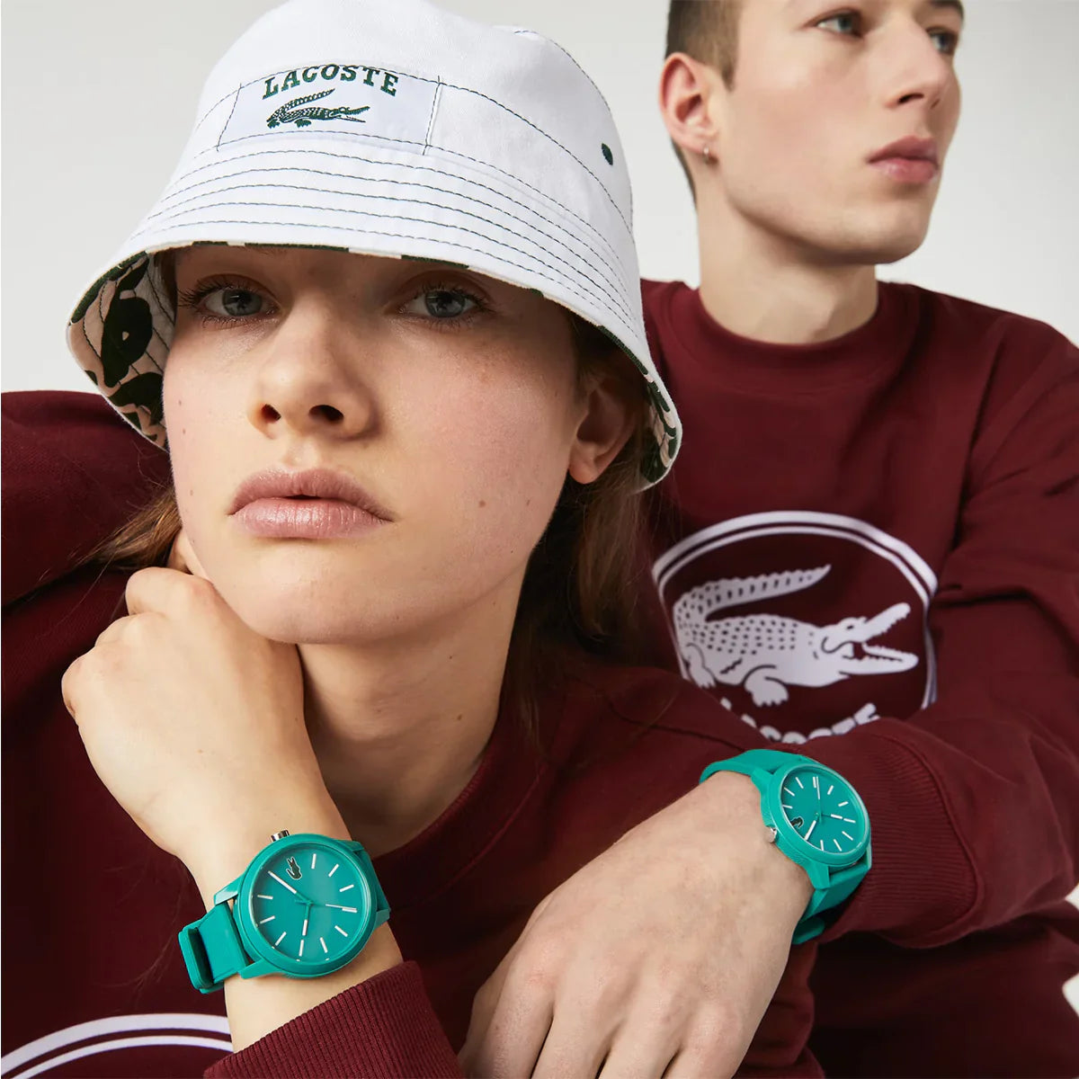 Lacoste 2011192 green dial watch worn on wrist with silicone band