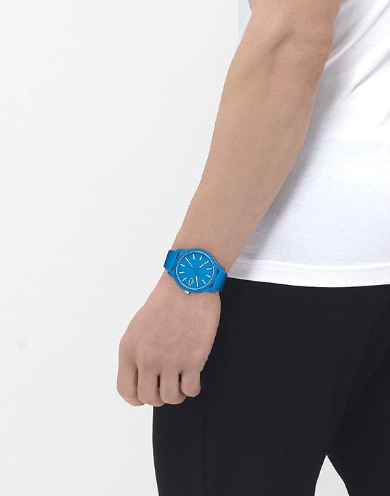 Lacoste blue silicone watch worn on wrist