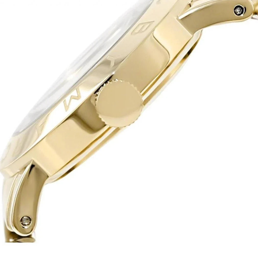 Side view of gold-plated case showing crown and bracelet attachment
