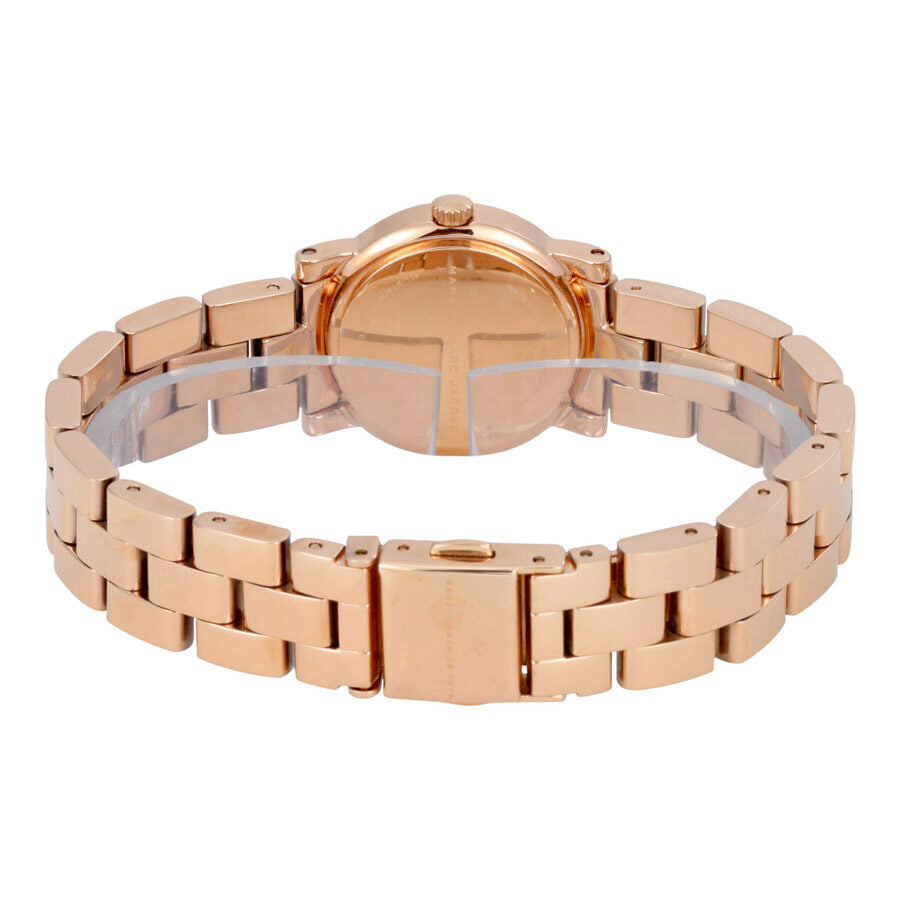Rose gold Baker watch caseback showing crystal and bracelet underside