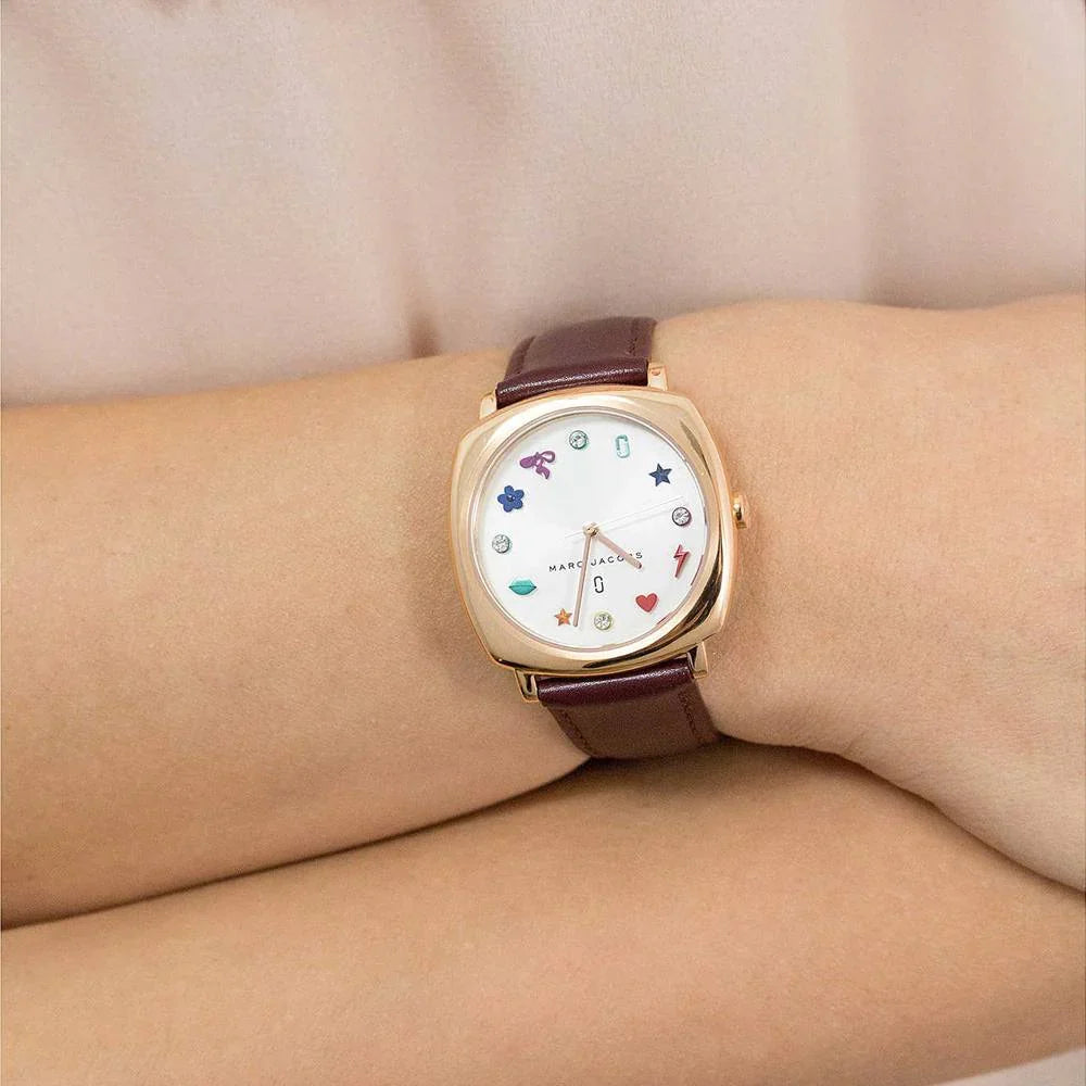 Marc Jacobs Mandy watch worn on wrist with white dial and brown leather band