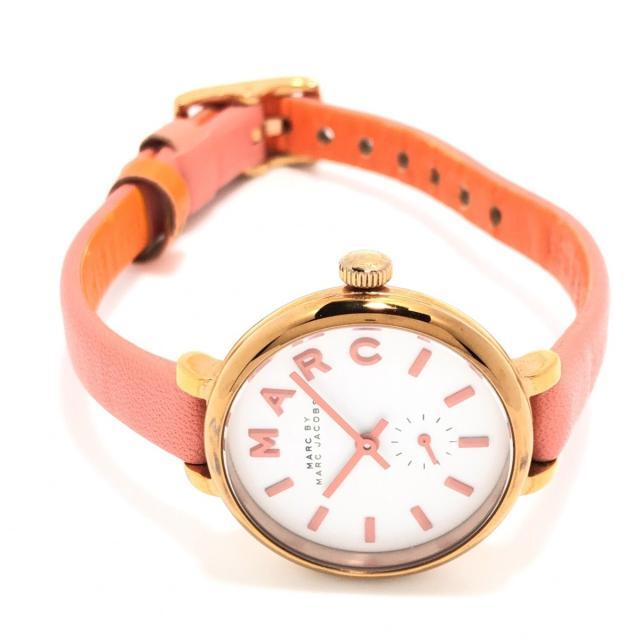 Sally watch at angle displaying rose gold case, pearlized dial, and peach strap