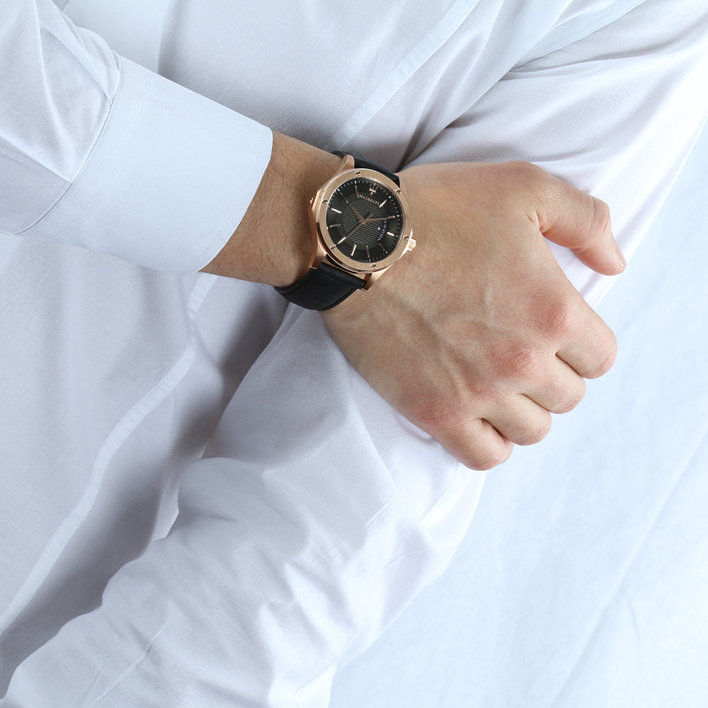 Maserati Circuito watch worn on wrist with black leather strap and white shirt