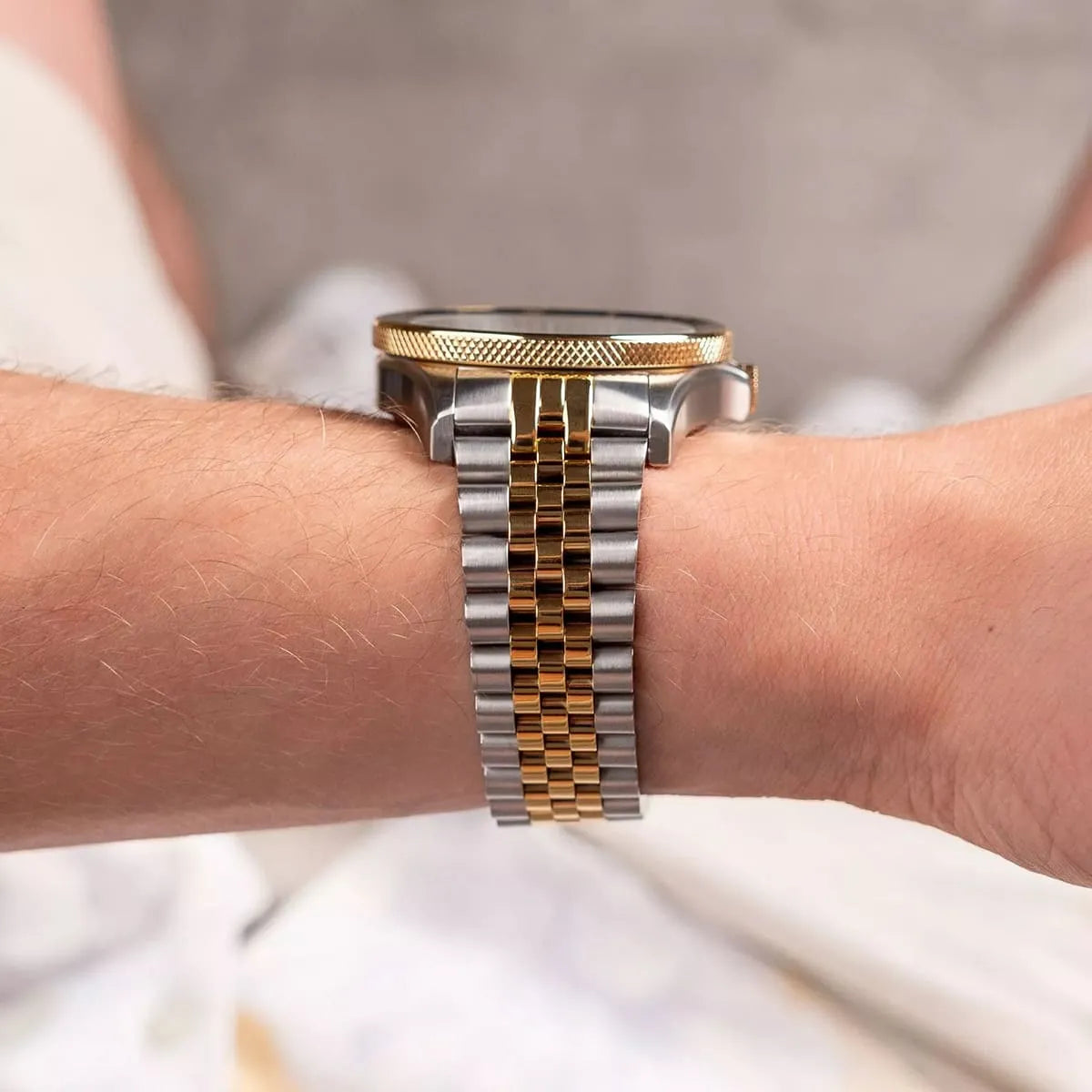 Maserati SFIDA two-tone steel and gold strap detail on wrist