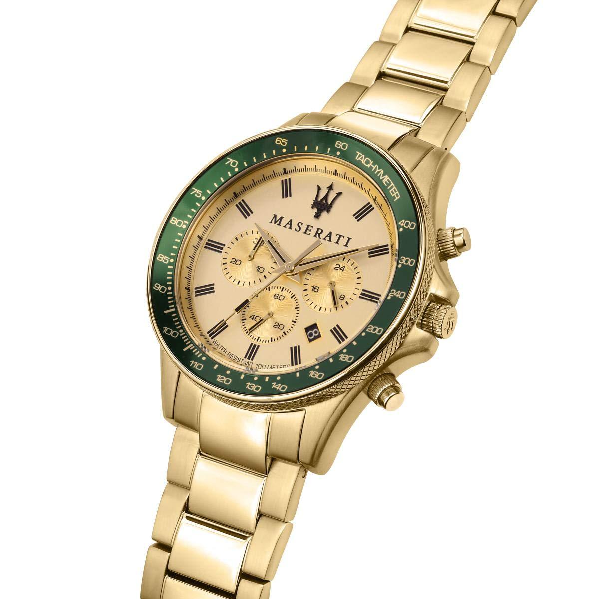 Angled side view of Maserati Sfida gold watch with green bezel and cream dial