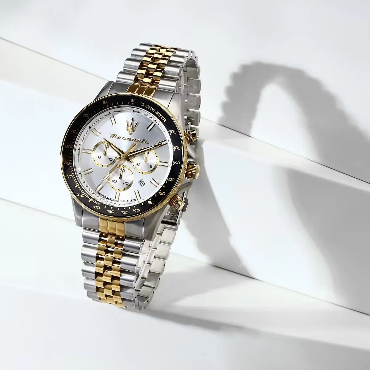 Maserati Sfida Sport worn view showing two-tone bracelet and white dial in natural light