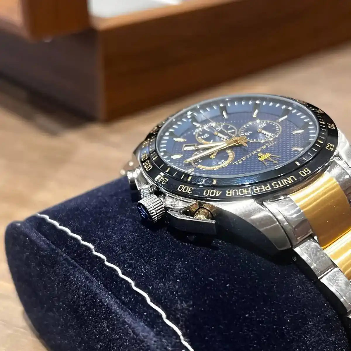 Maserati Traguardo watch on wrist displaying blue dial and chronograph subdials