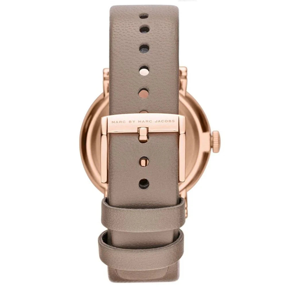 Close-up of grey leather strap with rose gold buckle and adjustment holes