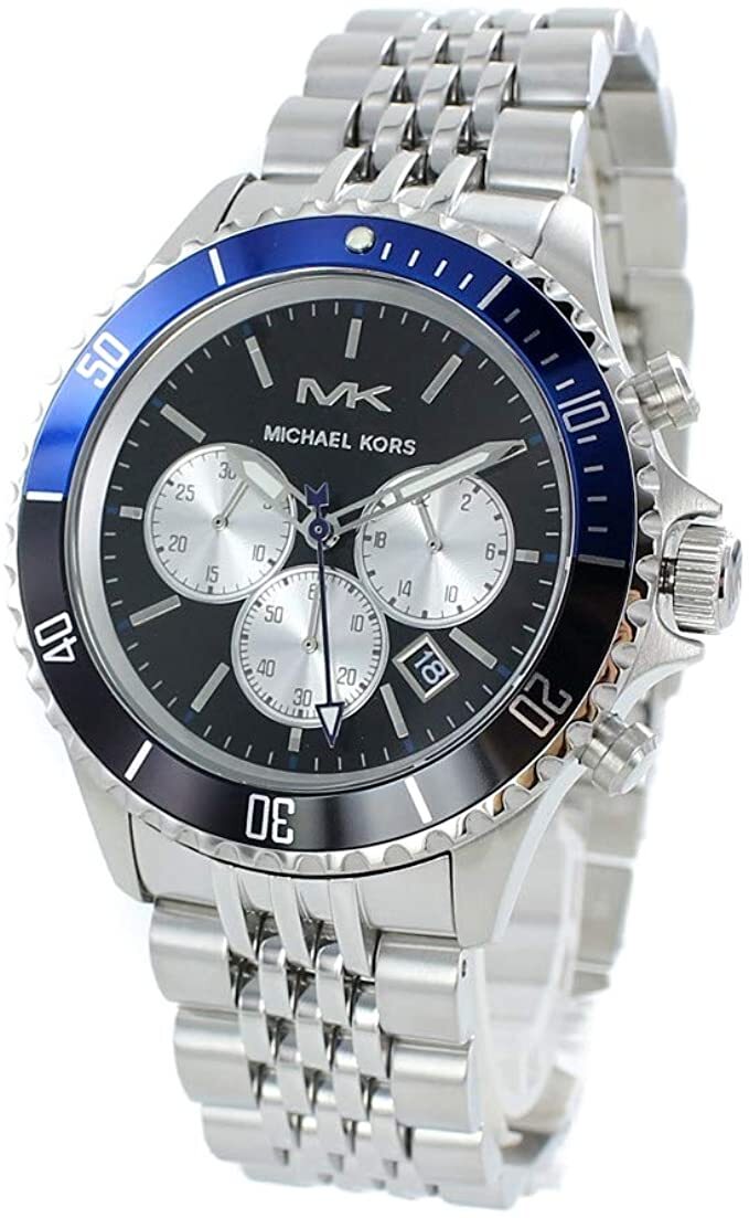Michael Kors Bayville chronograph watch shown at angle with silver bracelet and black dial