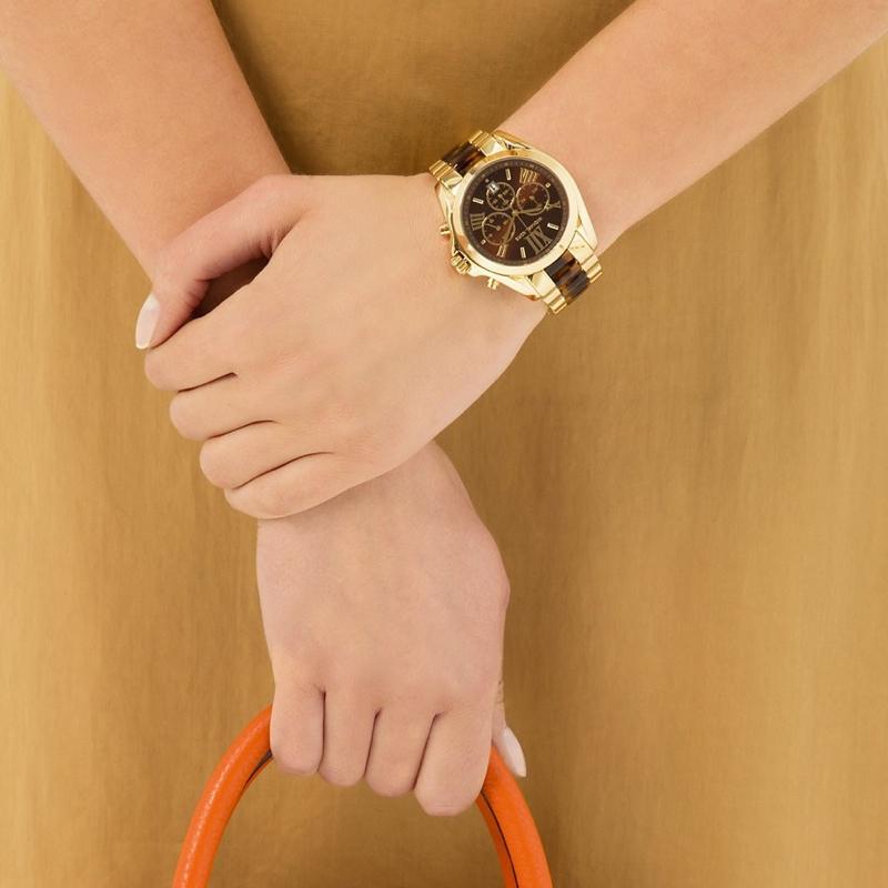 Michael Kors Bradshaw MK5696 gold and tortoiseshell watch on wrist