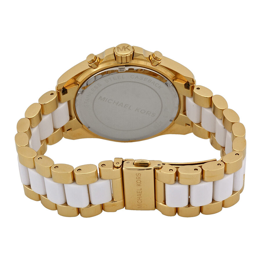 Michael Kors Bradshaw watch caseback showing gold-tone two-tone bracelet