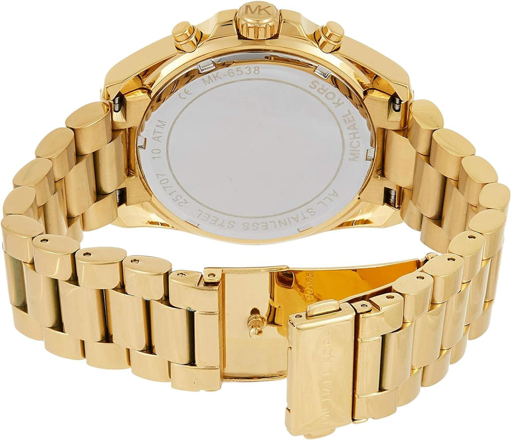 Michael Kors Bradshaw MK6538 case back showing gold stainless steel bracelet and watch back