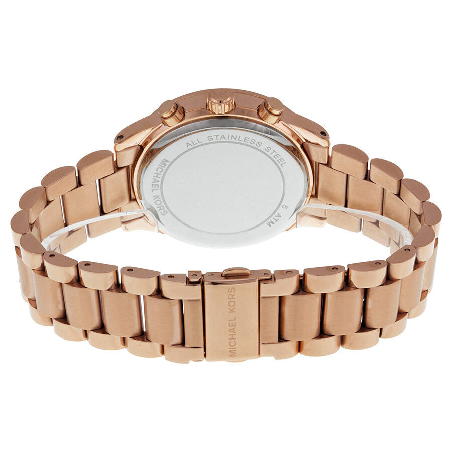 Michael Kors Brinkley watch caseback showing stainless steel with engraved branding