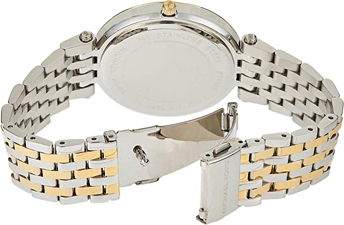 Case back of Michael Kors Darci MK3401 watch with two-tone bracelet and deployment clasp