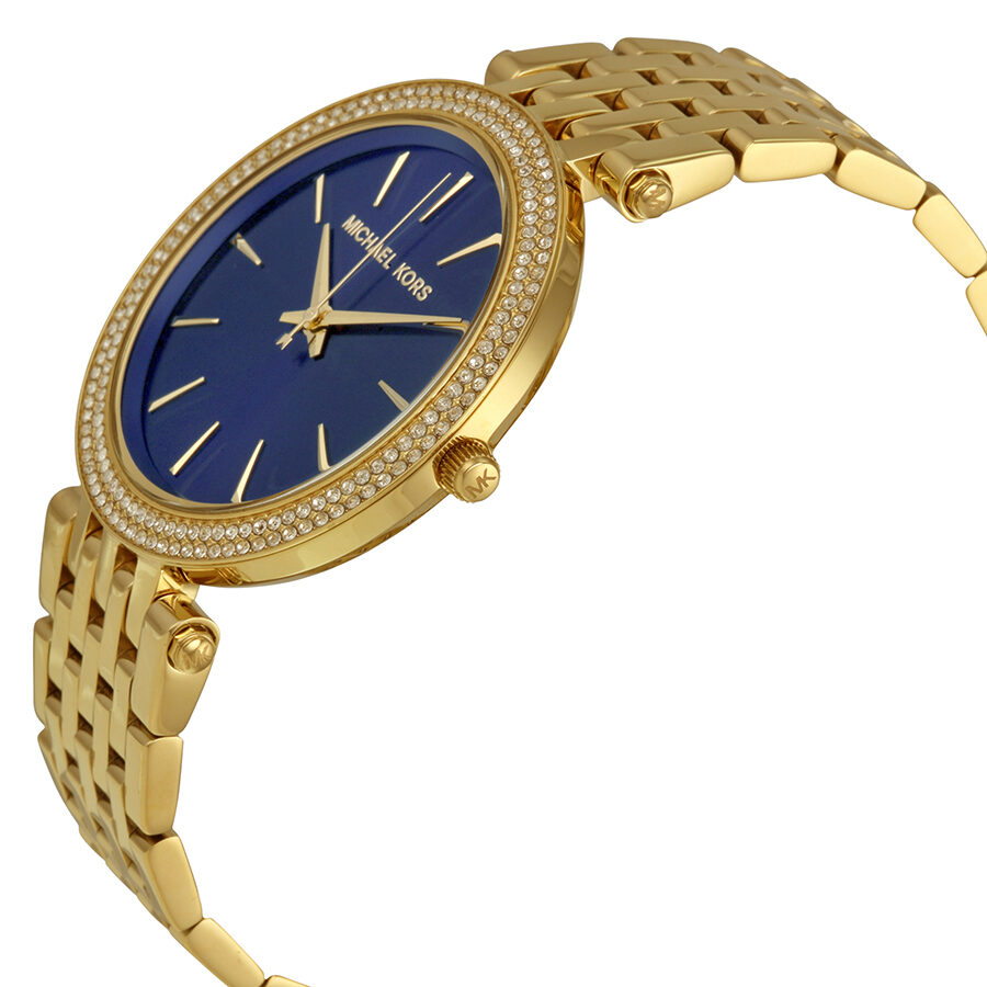 Michael Kors Darci watch angled view showing blue dial and gold bracelet