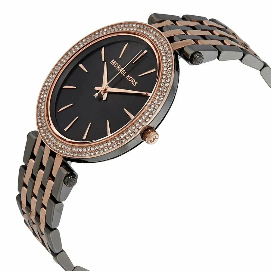 Side angle view of Michael Kors Darci watch showing grey dial and two-tone stainless steel bracelet