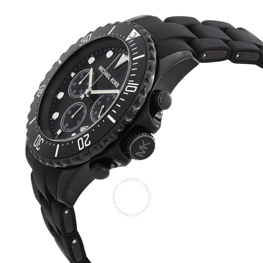 Michael Kors Everest chronograph watch shown at angle with black silicone strap and rotating bezel
