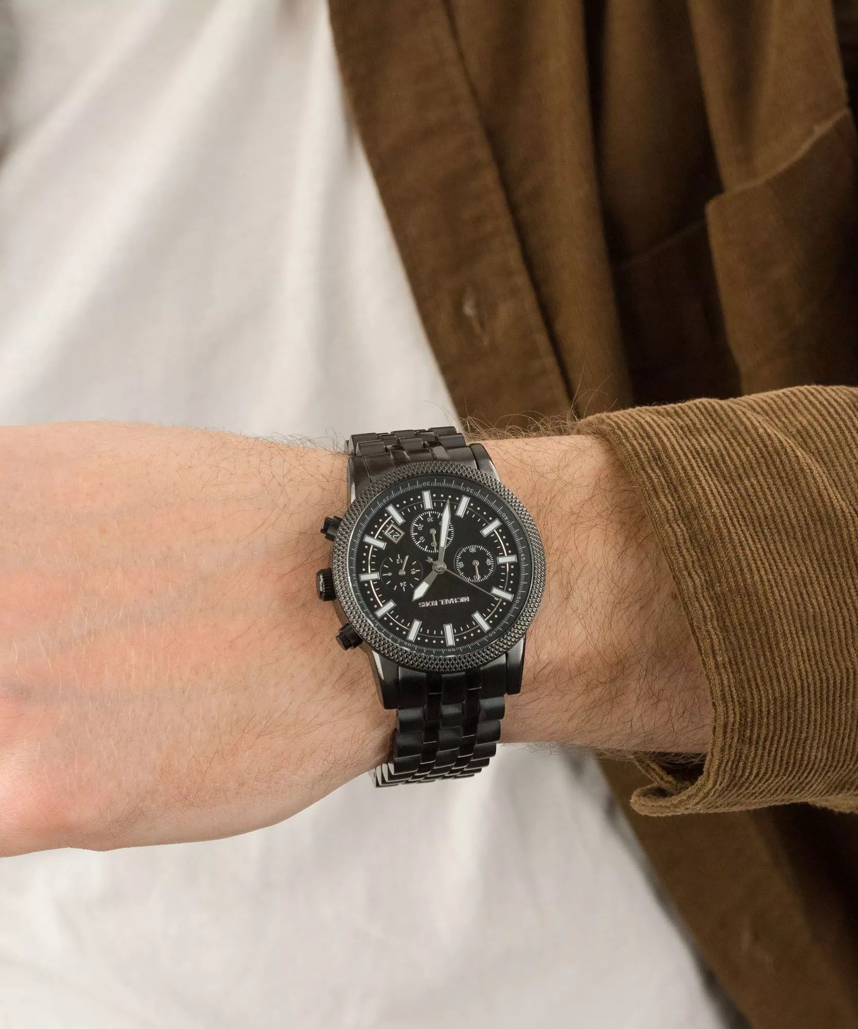 Michael Kors Hutton Chronograph MK9089 black watch worn on wrist