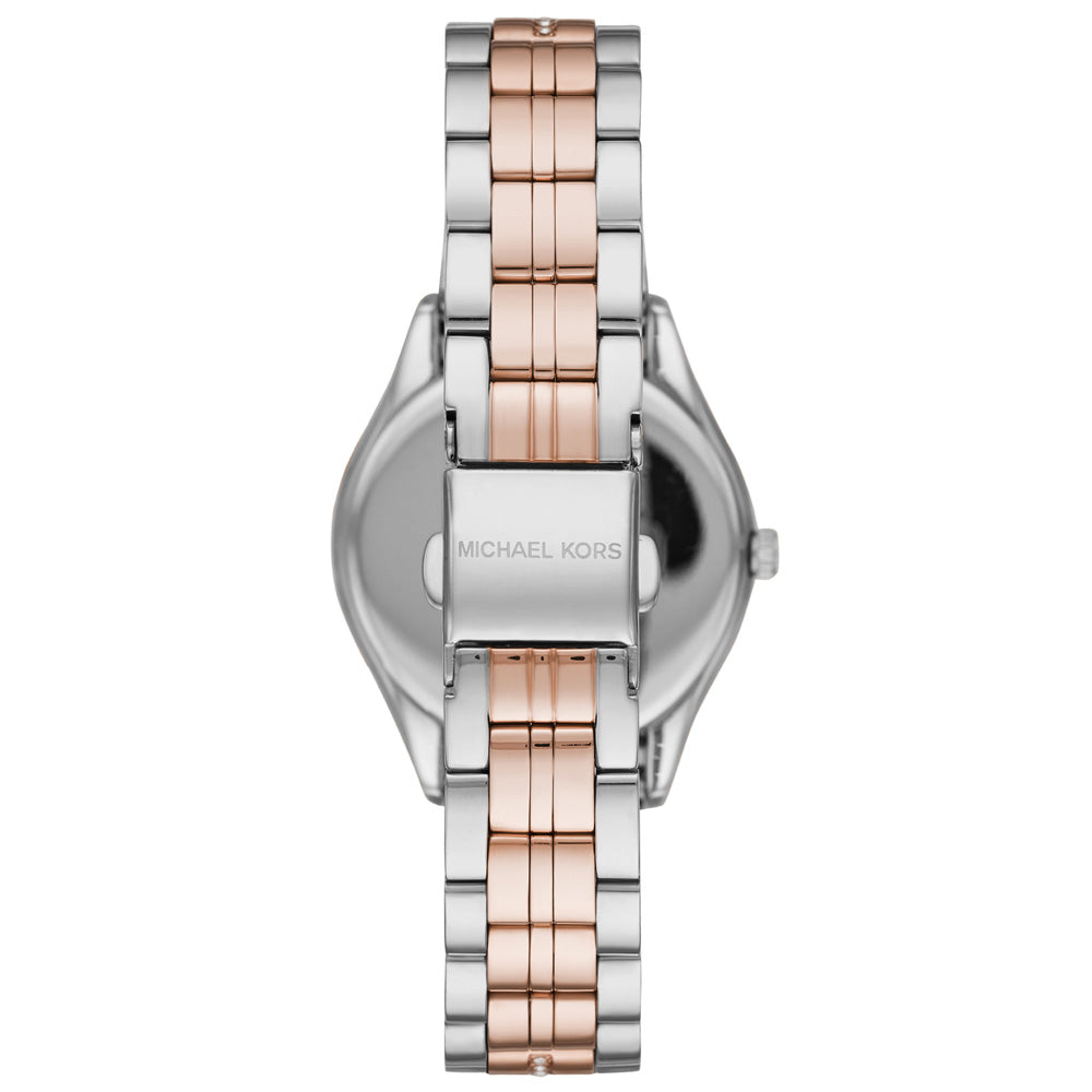 Caseback of Michael Kors Lauryn watch with rose gold and silver two-tone bracelet