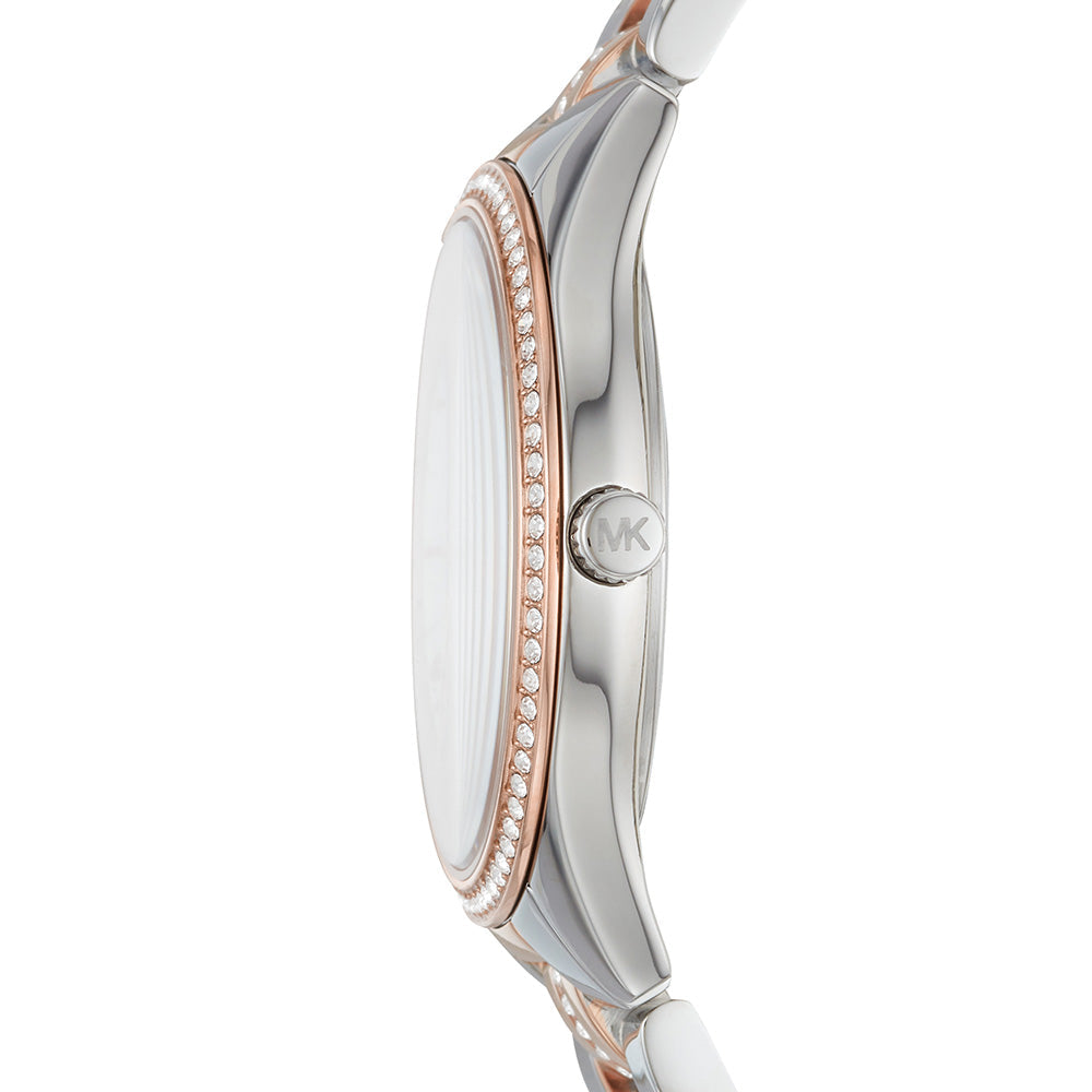Profile view of Michael Kors Lauryn case showing crystal bezel and mixed metal construction