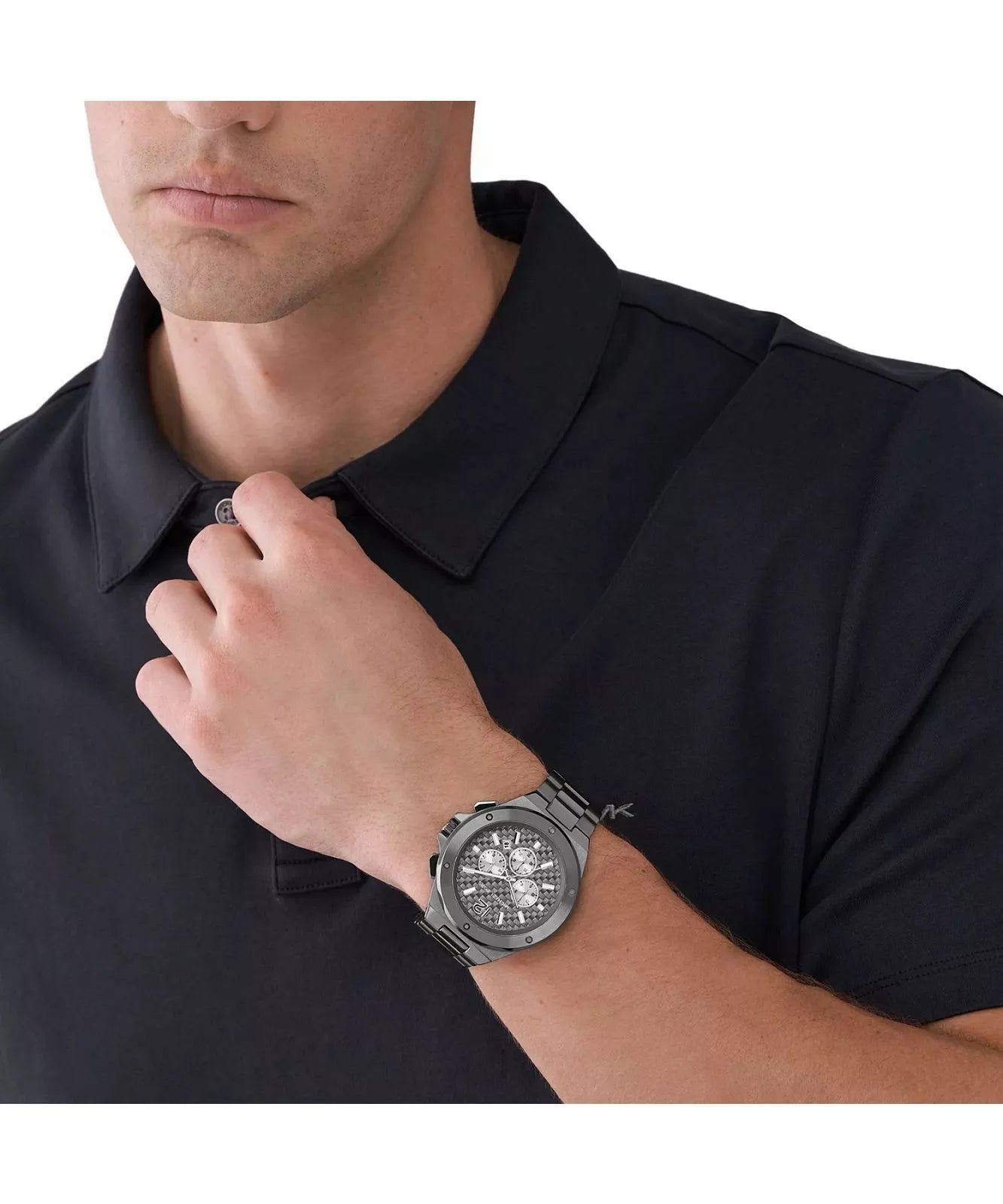 Michael Kors Lennox chronograph watch worn on wrist with dark clothing