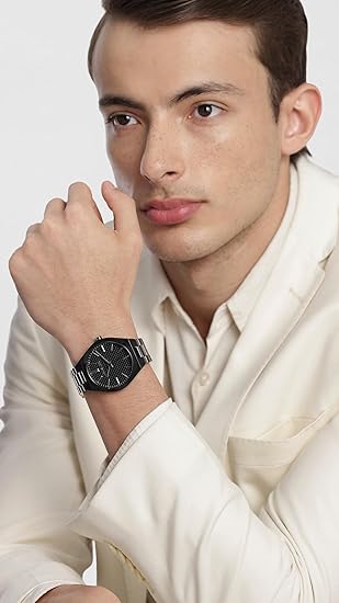 Michael Kors Lennox watch worn on wrist, black dial with black stainless steel bracelet