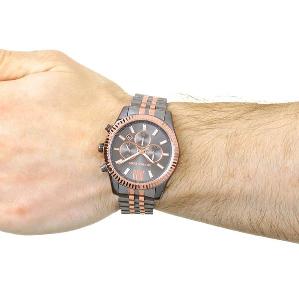 Michael Kors Lexington MK8561 chronograph on wrist showing grey dial and two-tone band