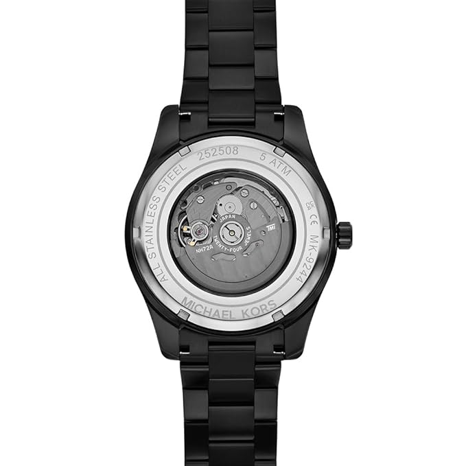 Michael Kors Lexington MK9244 caseback showing visible automatic movement and serial number