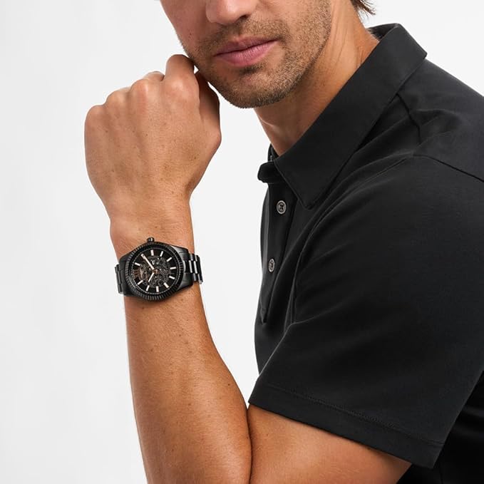 Michael Kors Lexington MK9244 automatic watch worn on wrist showing skeleton dial and design