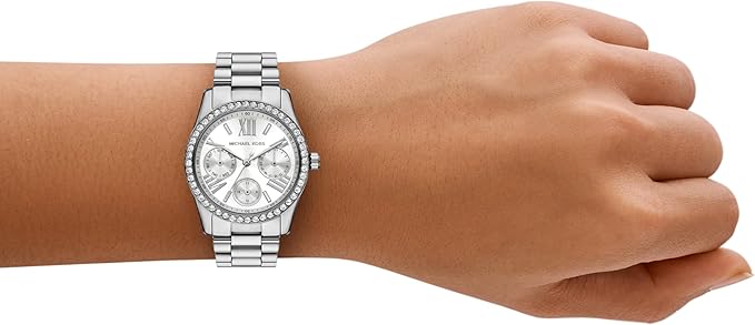 Michael Kors MK4979 women's multifunction watch worn on wrist with stainless steel bracelet