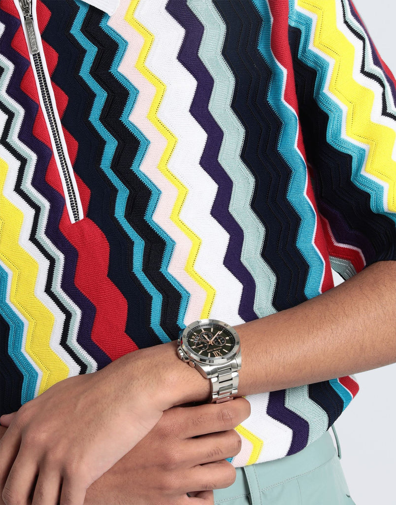 Michael Kors Brecken MK8984 oversized chronograph watch worn on wrist with striped shirt