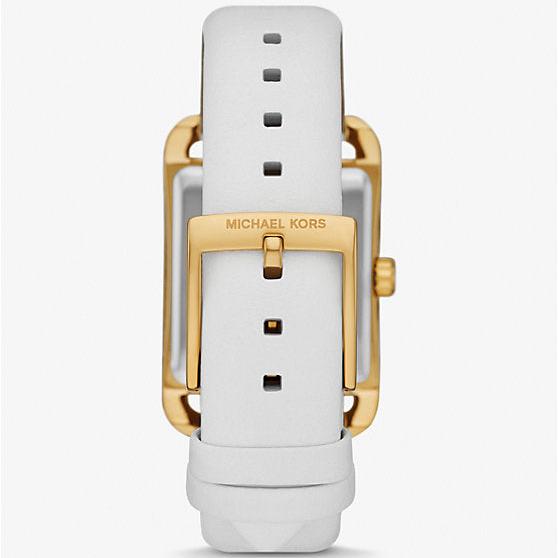 Top-down view of Michael Kors Petite watch with white leather strap and gold-tone buckle