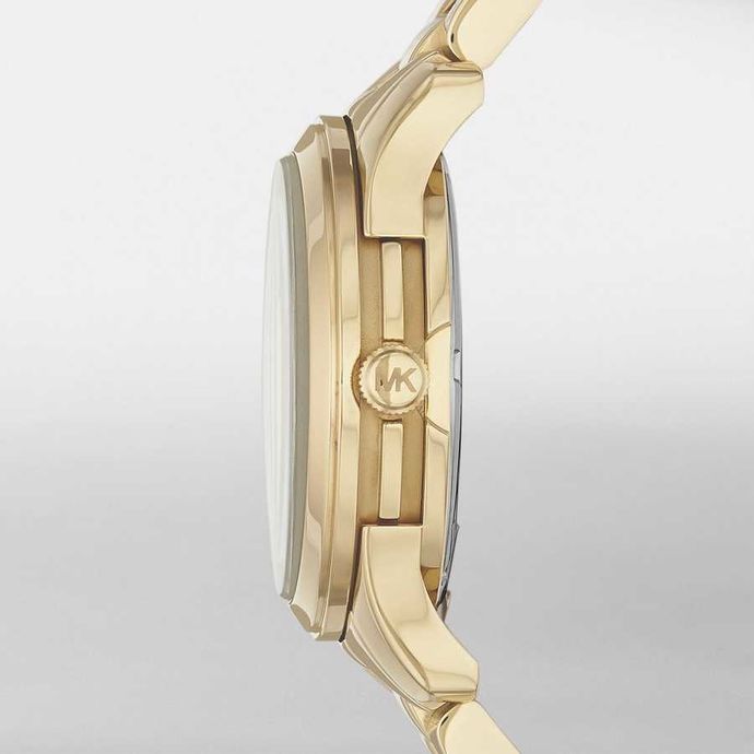 Side view of Michael Kors Runway gold tone watch showing case profile and thickness