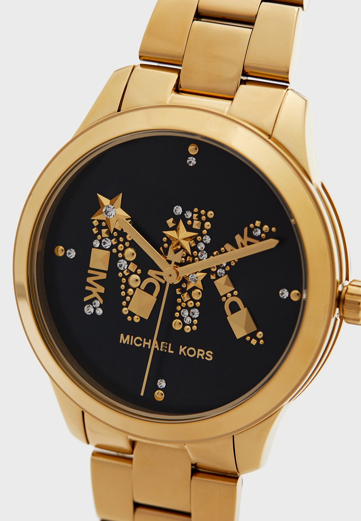 Michael Kors Runway watch angled view showing gold bracelet, black dial, and decorative MK initials