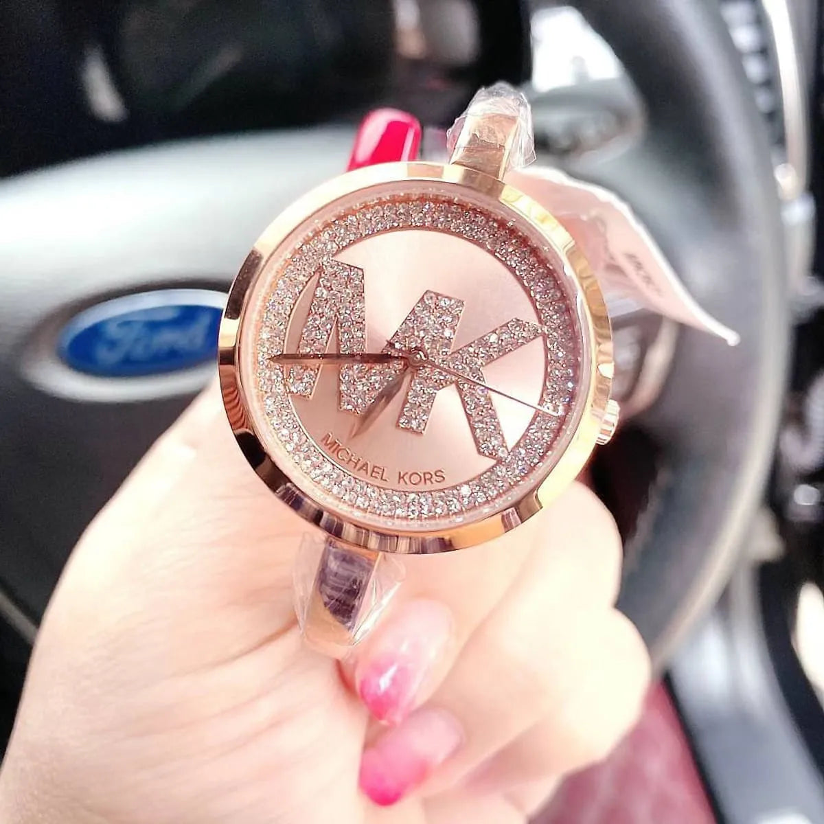 Michael Kors Blakley crystal-set dial and strap detail in rose gold tone
