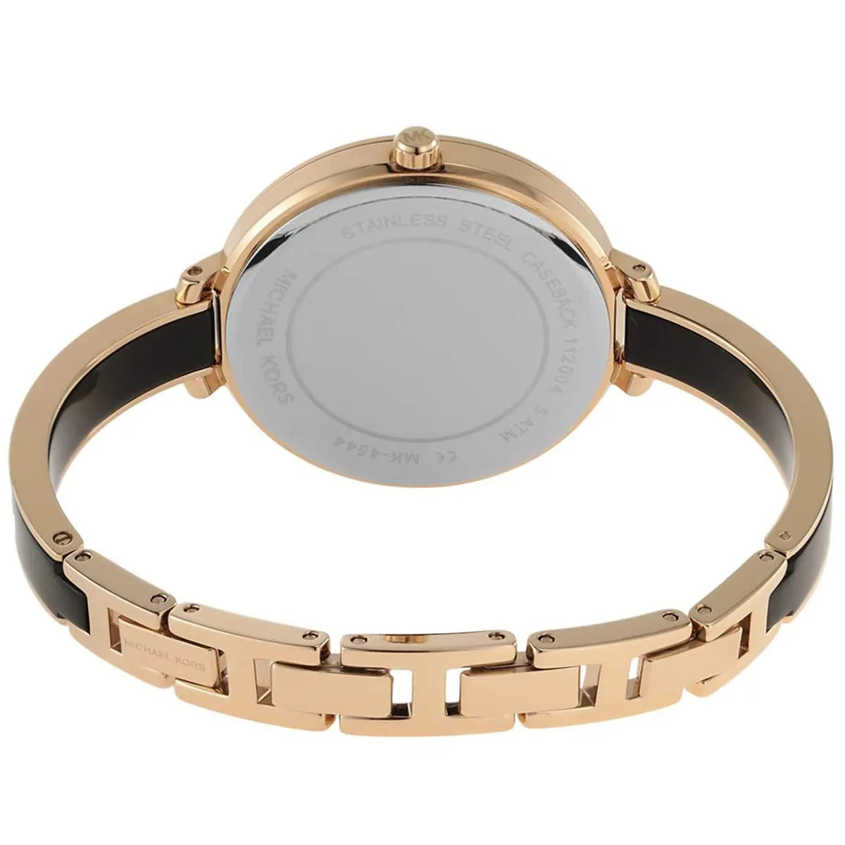 Michael Kors Jaryn watch worn on wrist showing gold bangle band and full case profile