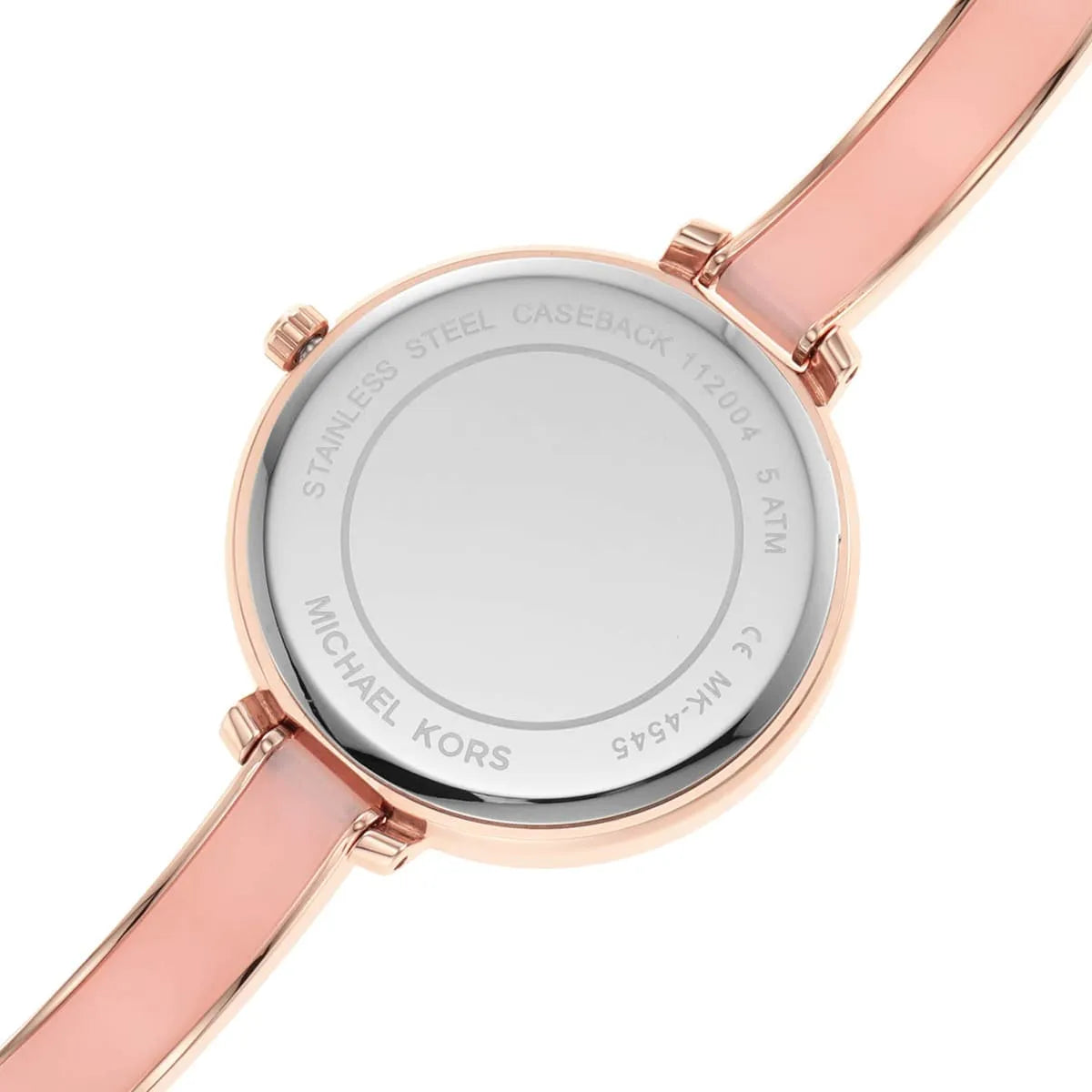 Michael Kors Jaryn watch caseback showing stainless steel case and crystal