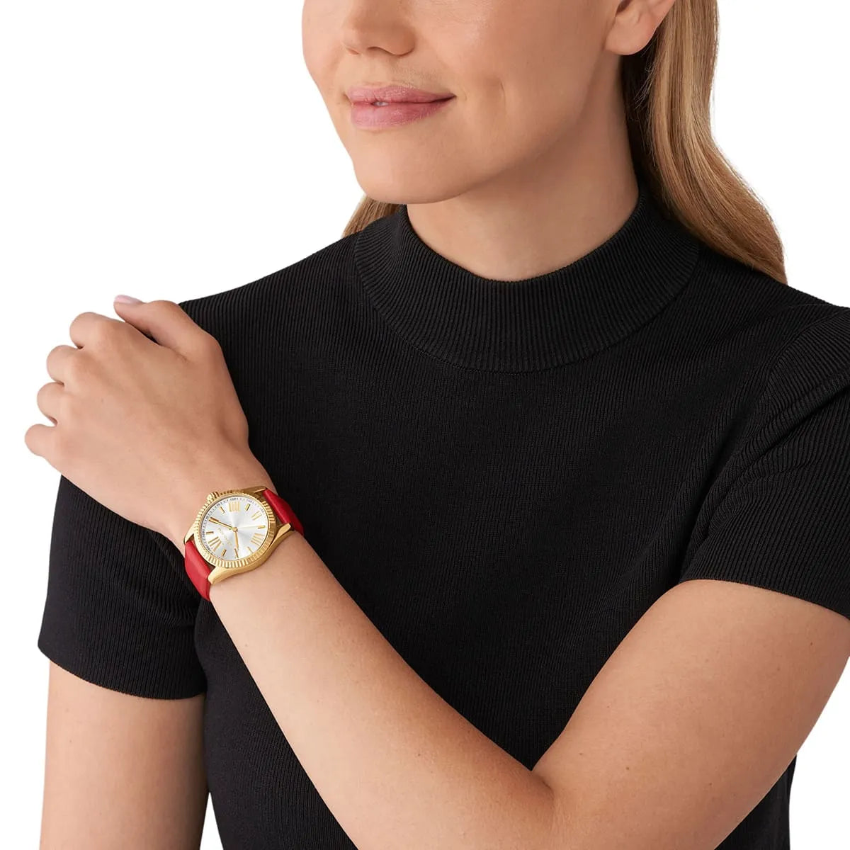 Michael Kors Lexington women's gold watch with red leather strap worn on wrist