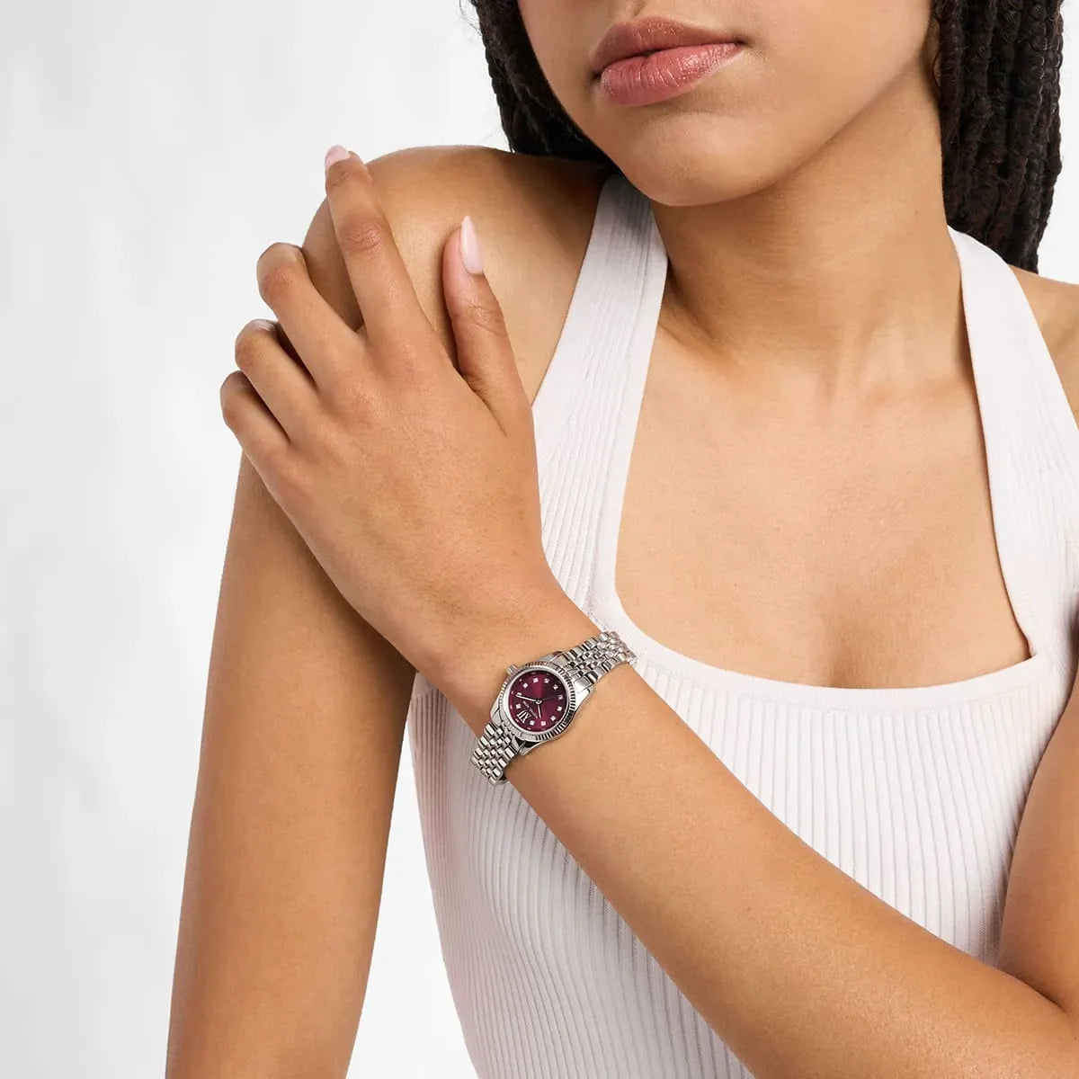 Michael Kors Lexington MK4968 worn on wrist showing burgundy dial and silver metal strap